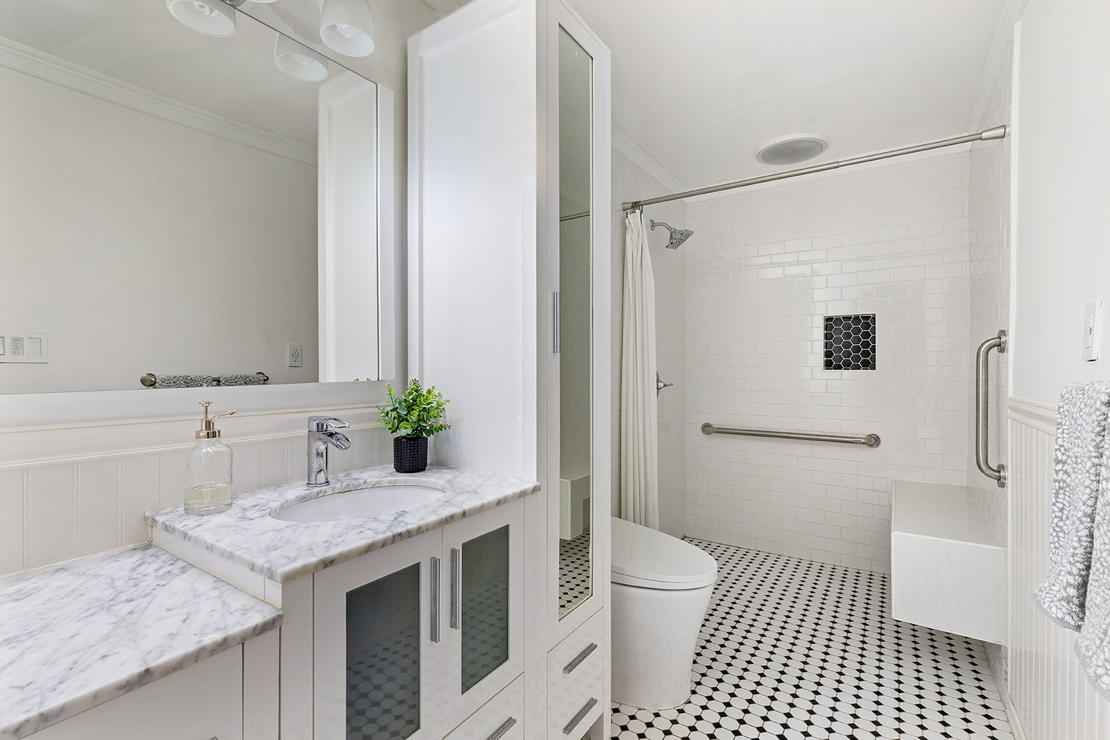 156 Bainbridge Street Brooklyn, NY 11233 - Photo 3 of 14 a bathroom with a granite countertop sink toilet and shower