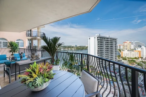 a view of a balcony with chairs