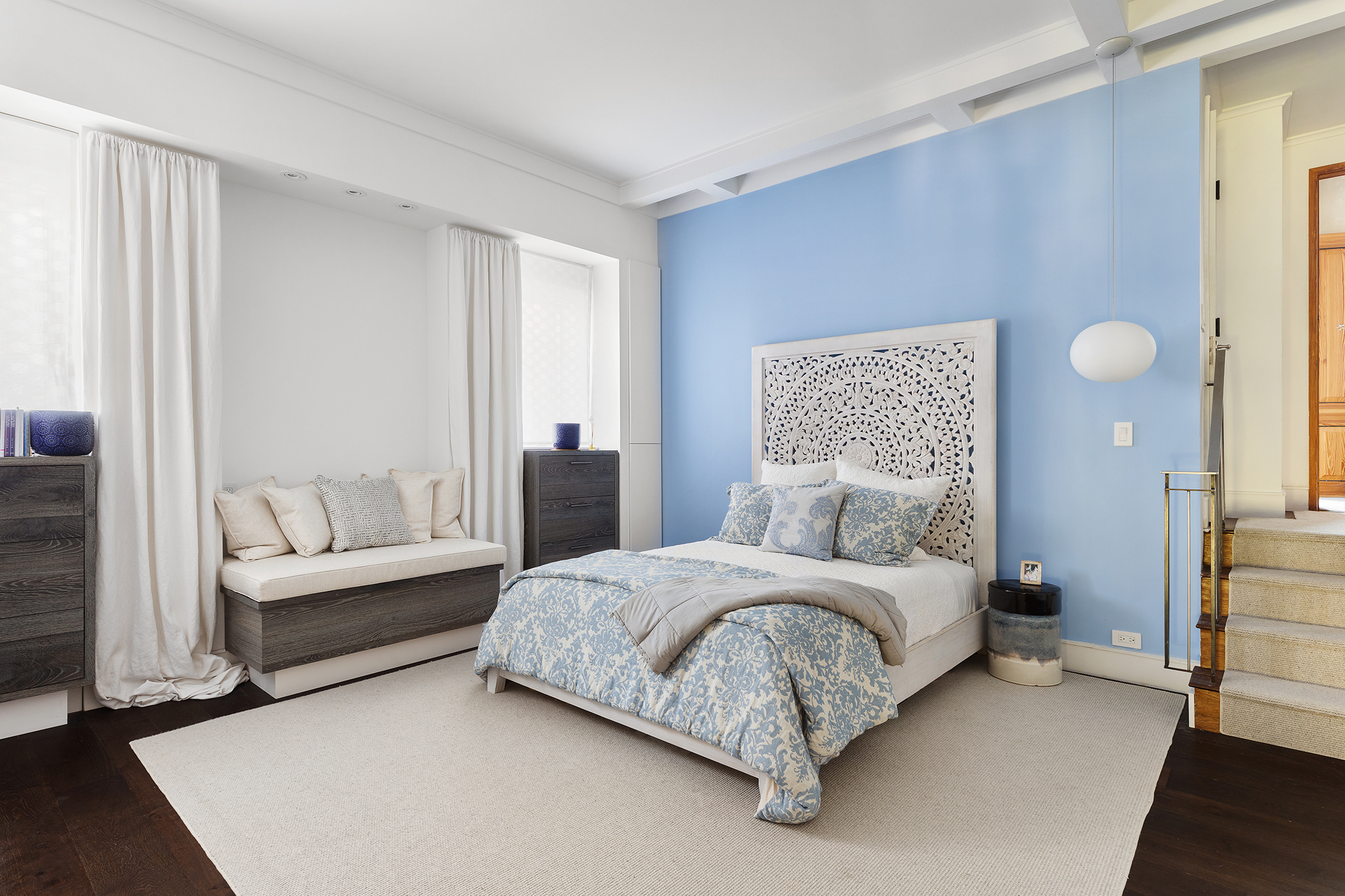 428 Columbus Avenue, Unit PH Manhattan, NY 10024 - Photo 13 of 21 a bedroom with a bed and a couch