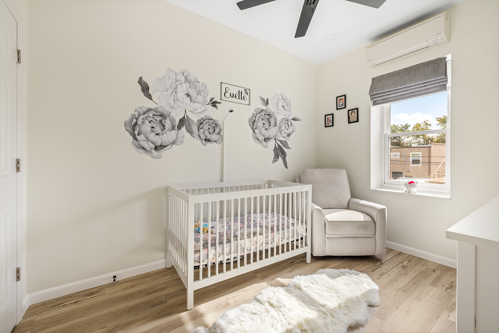 466 81st Street Brooklyn, NY 11209 - Photo 9 of 15 a view of a room with furniture and a window