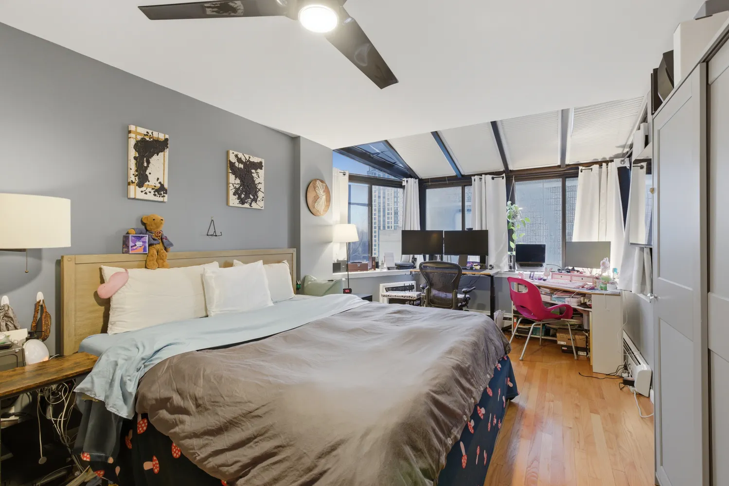 a bed room with a bed and a chair