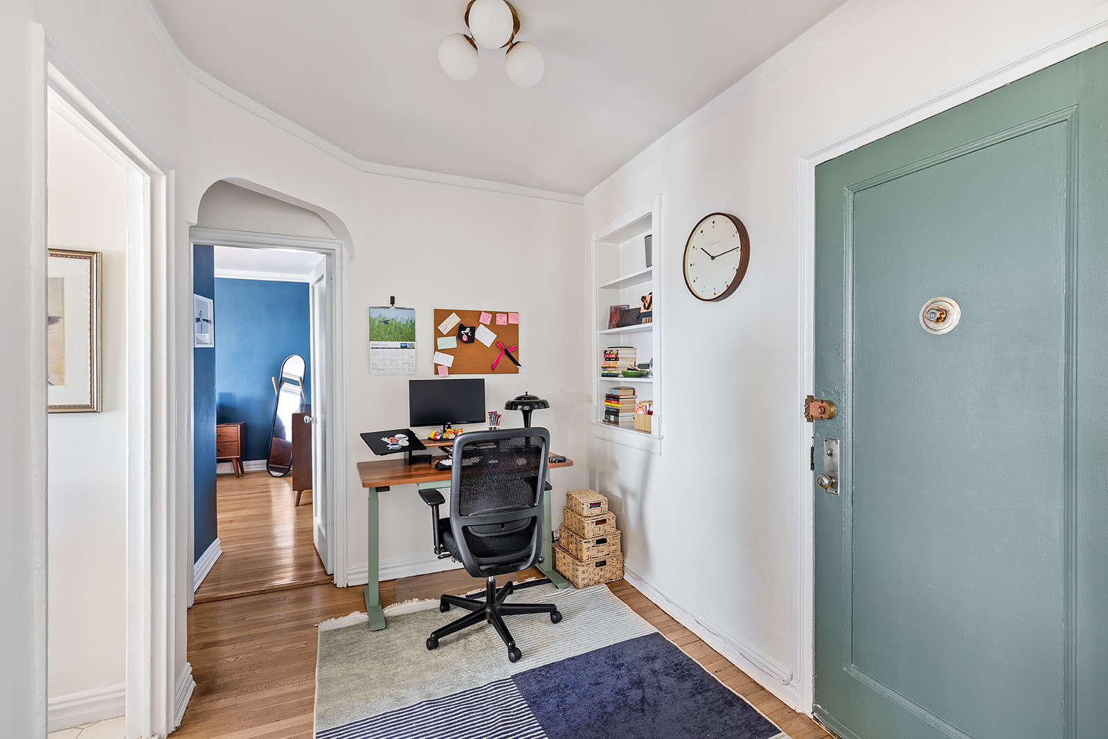140 East 2nd Street, Unit 5B Brooklyn, NY 11218 - Photo 4 of 7 a view of a workspace with furniture and a window