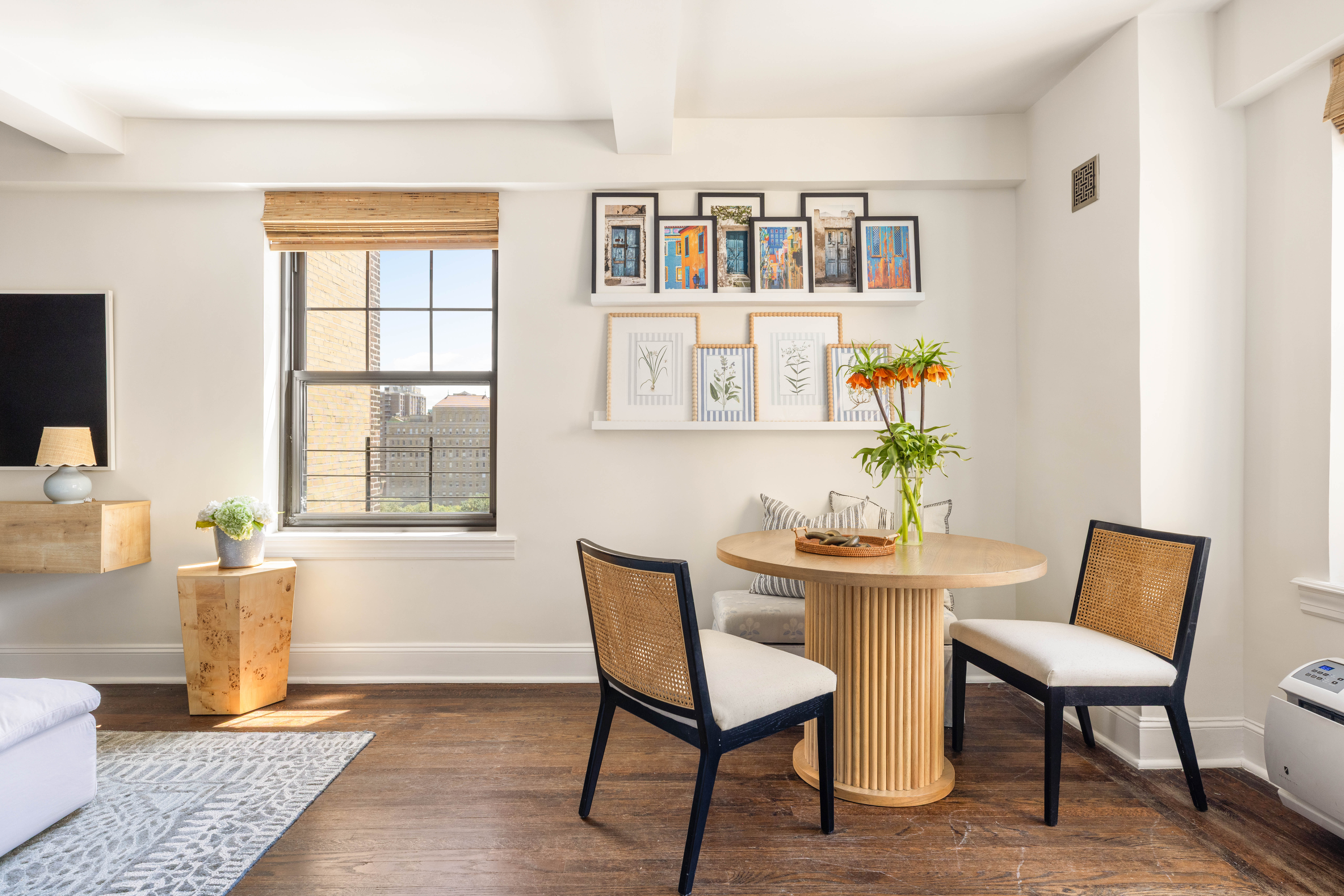 200 East 16th Street, Unit 14C Manhattan, NY 10003 - Photo 6 of 14 a dining room with furniture and window