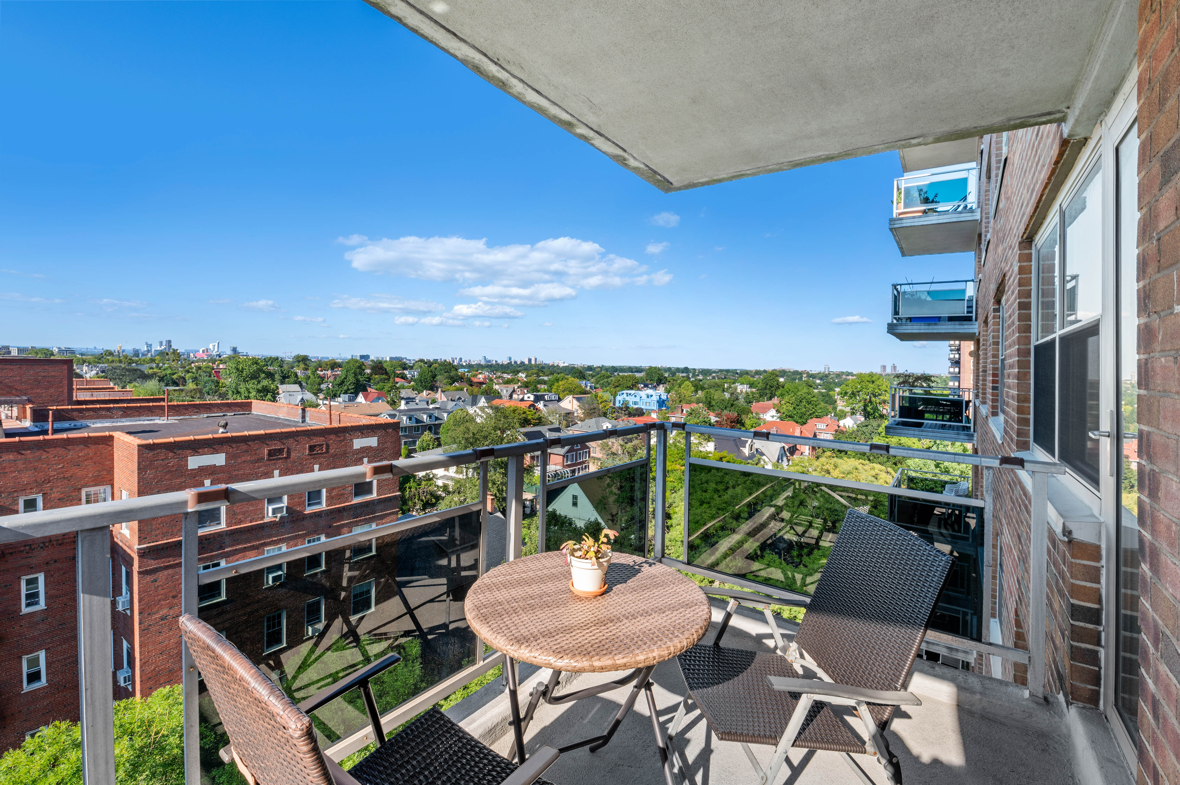 70-31 108th Street, Unit 9C Queens, NY 11375 - Photo 7 of 11 a view of a chairs and table in patio