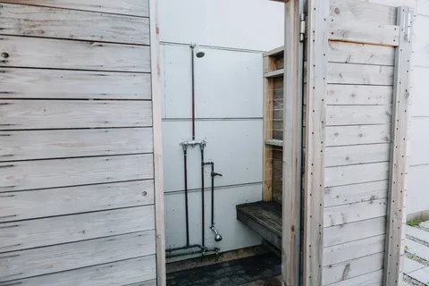 a view of a ocean with a mountain