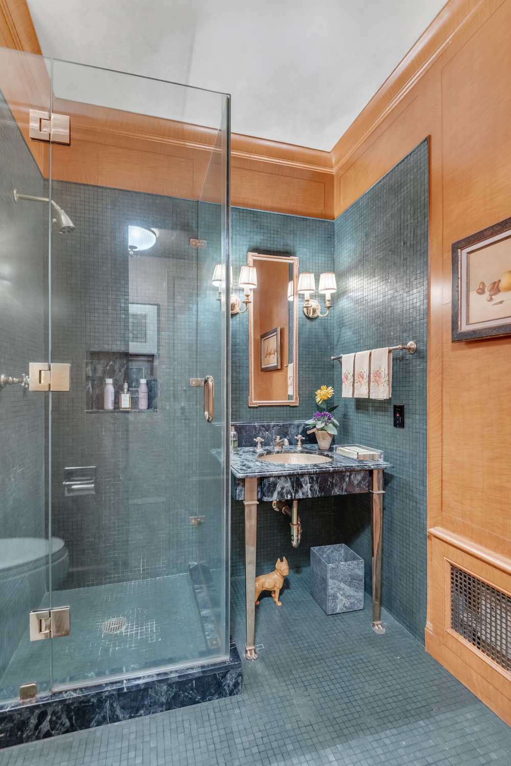 115 Central Park West, Unit 3B Manhattan, NY 10023 - Photo 11 of 20 a view of a bathroom with a shower a sink and a mirror