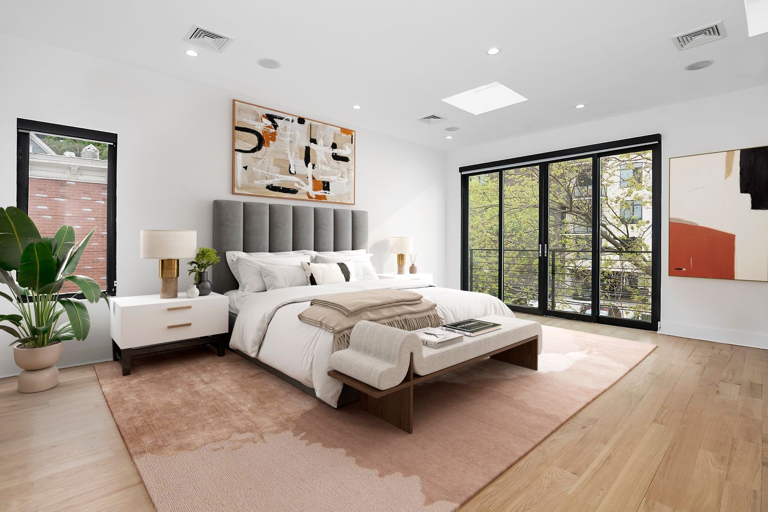 296 Fenimore Street Brooklyn, NY 11225 - Photo 8 of 19 a spacious bedroom with a bed and a large window