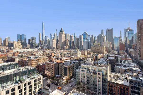 a view of a city with tall buildings