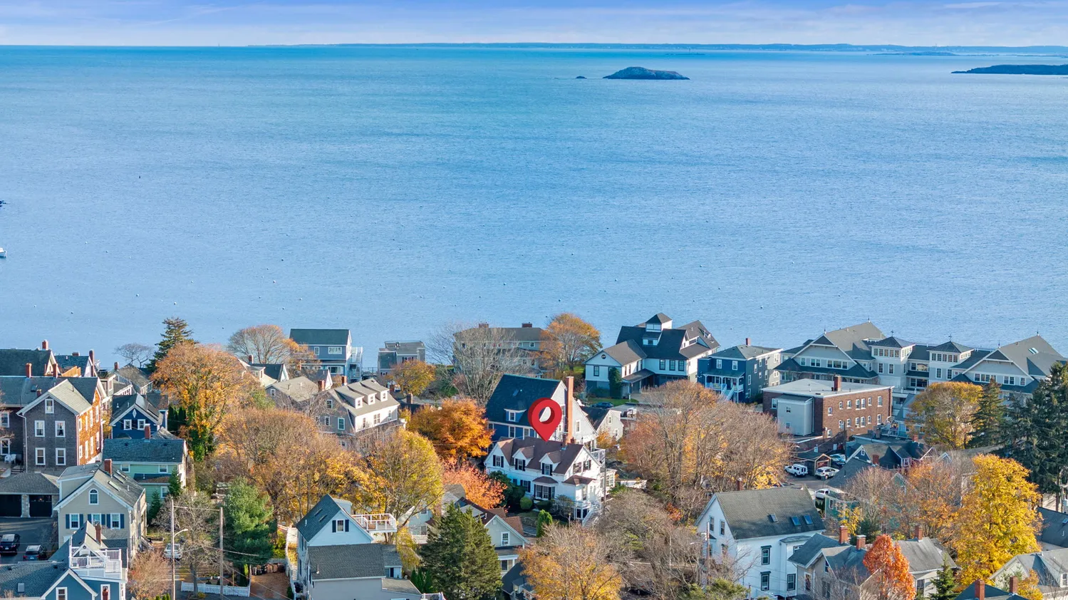 front view of a house with a garden