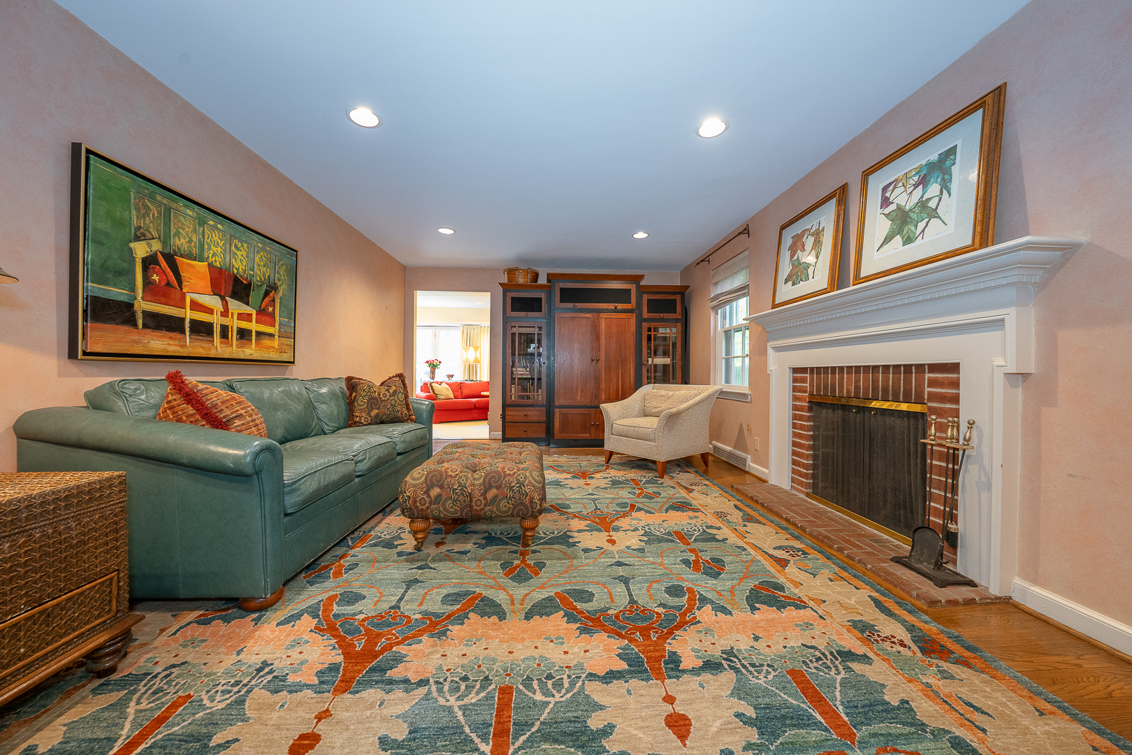 519 Mercer Road Merion Station, PA 19066 - Photo 25 of 58 a living room with furniture and a fireplace