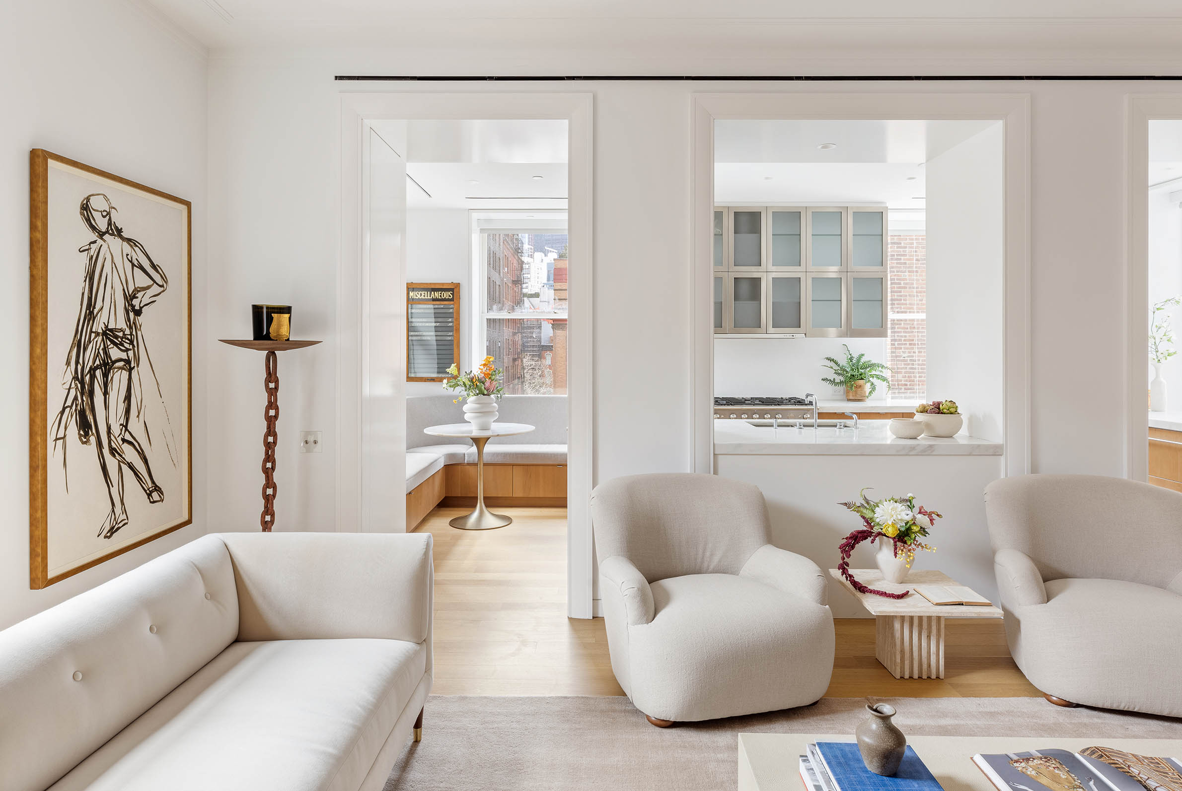7 Harrison Street, Unit 5S Manhattan, NY 10013 - Photo 9 of 21 a living room with furniture and a potted plant