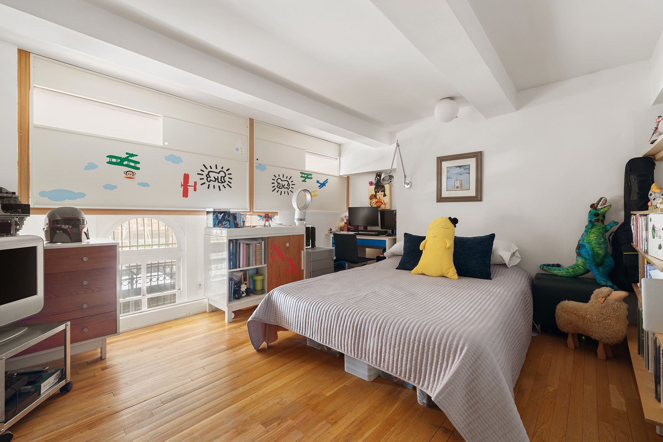 240 Centre Street, Unit 2B Manhattan, NY 10013 - Photo 9 of 12 a bed room with a bed and a chair