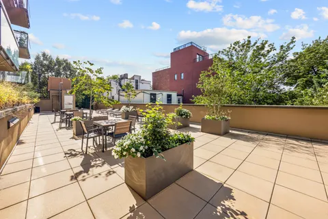 a view of a terrace with chairs