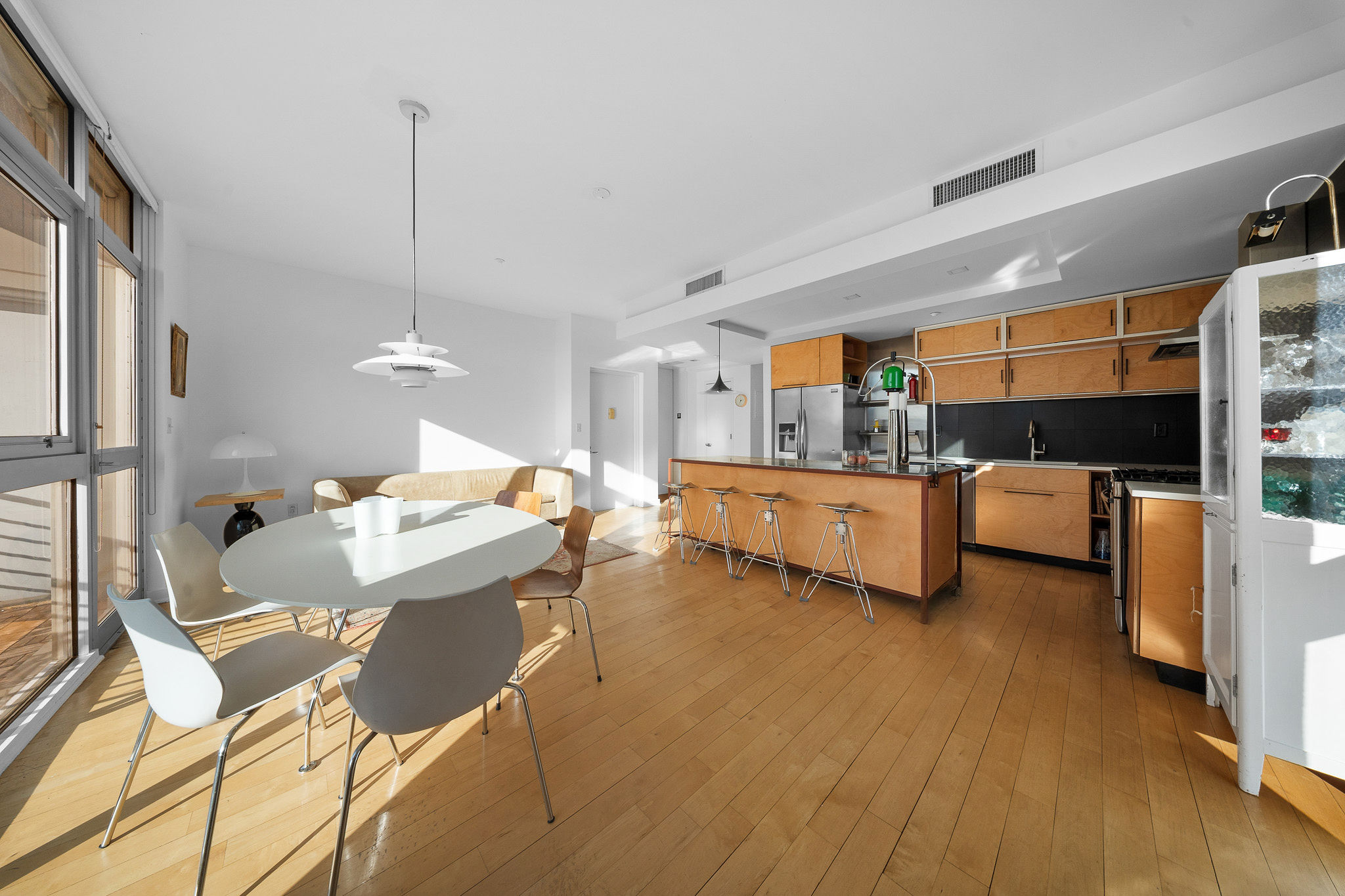 82 Guernsey Street, Unit 3B Brooklyn, NY 11222 - Photo 7 of 18 a living room with furniture and kitchen view
