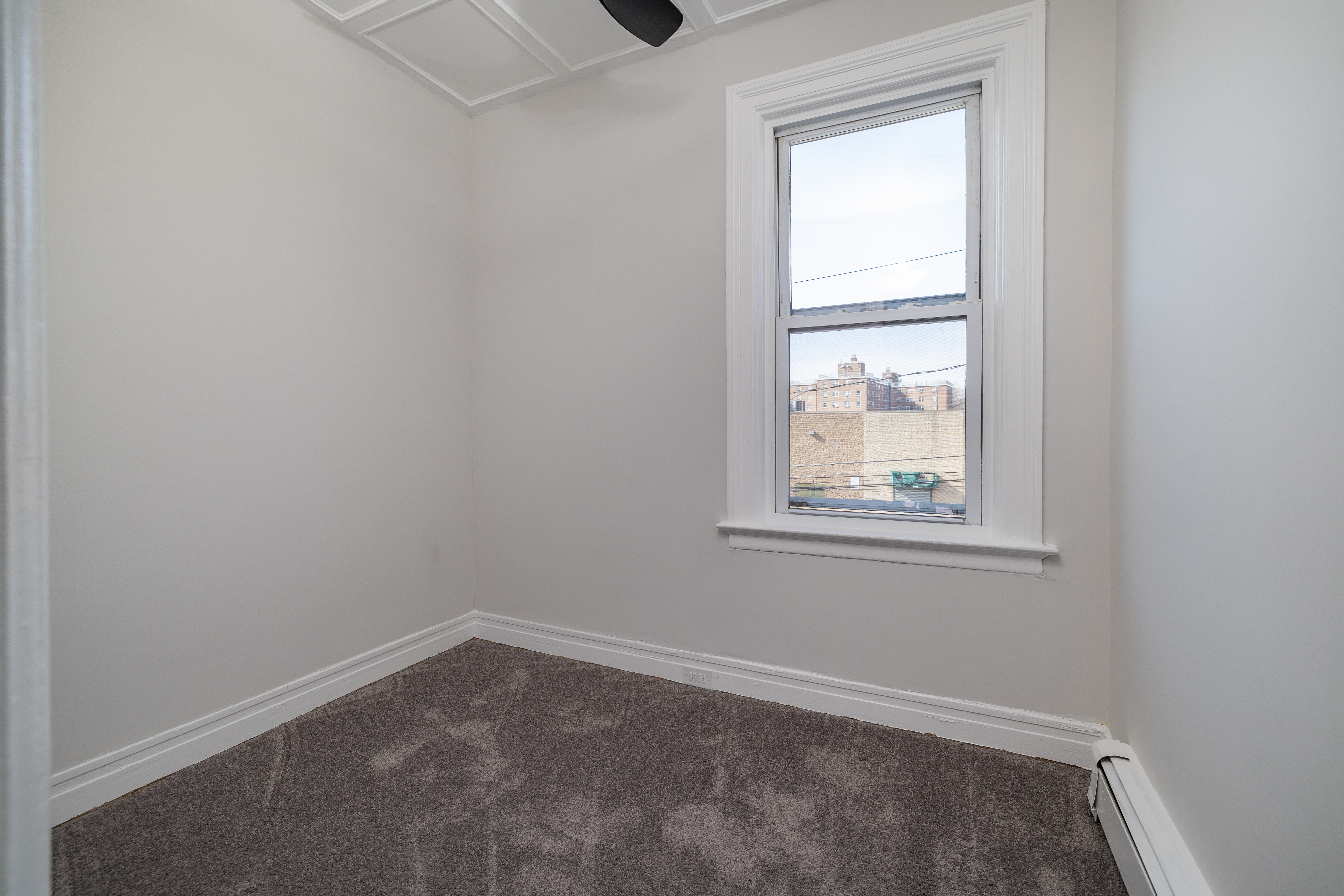 13-03 Brunswick Avenue Queens, NY 11691 - Photo 18 of 27 an empty room with windows