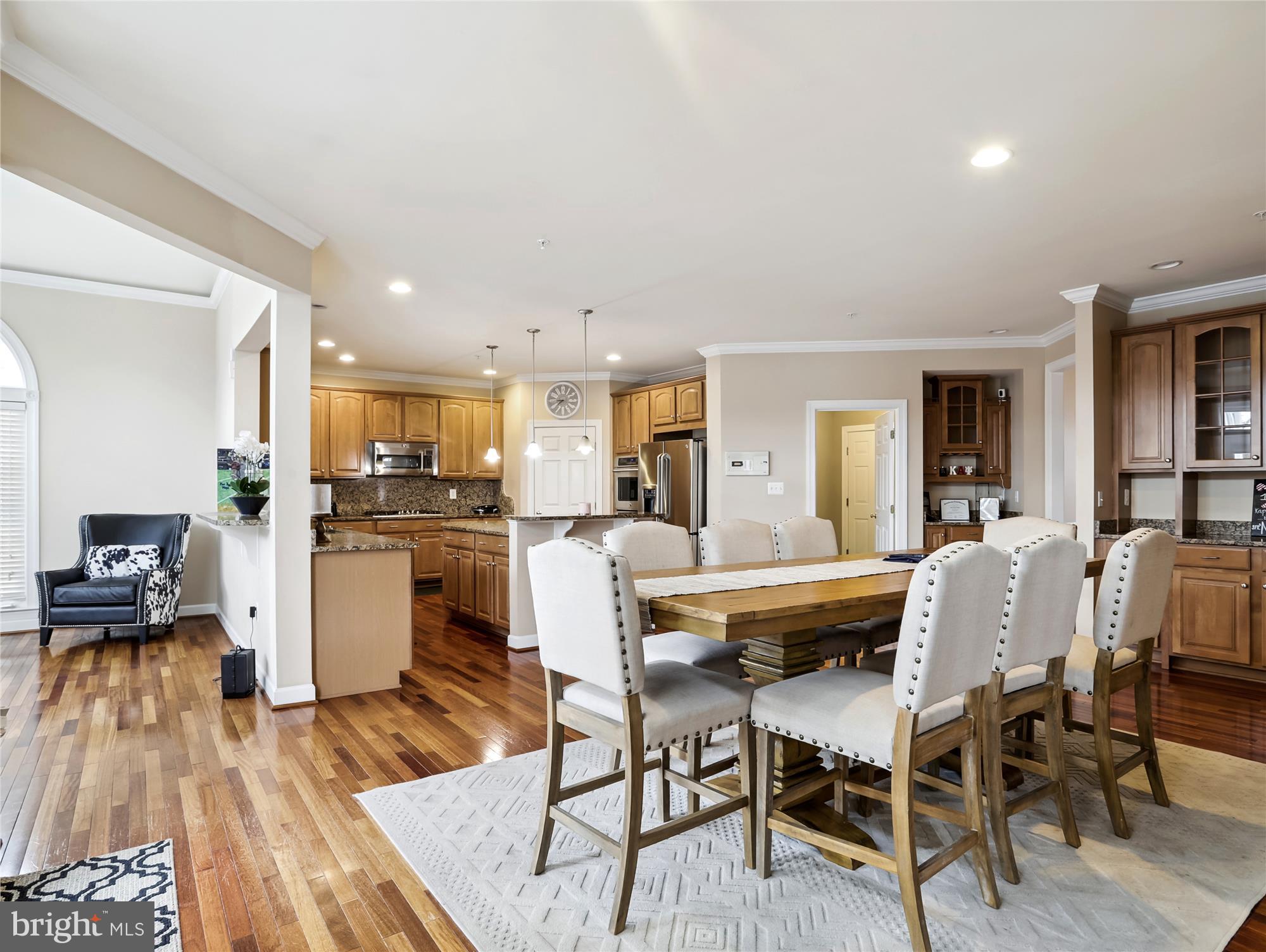 14302 Derby Ridge Road Bowie, MD 20721 - Photo 22 of 67 a dining room with furniture and wooden floor