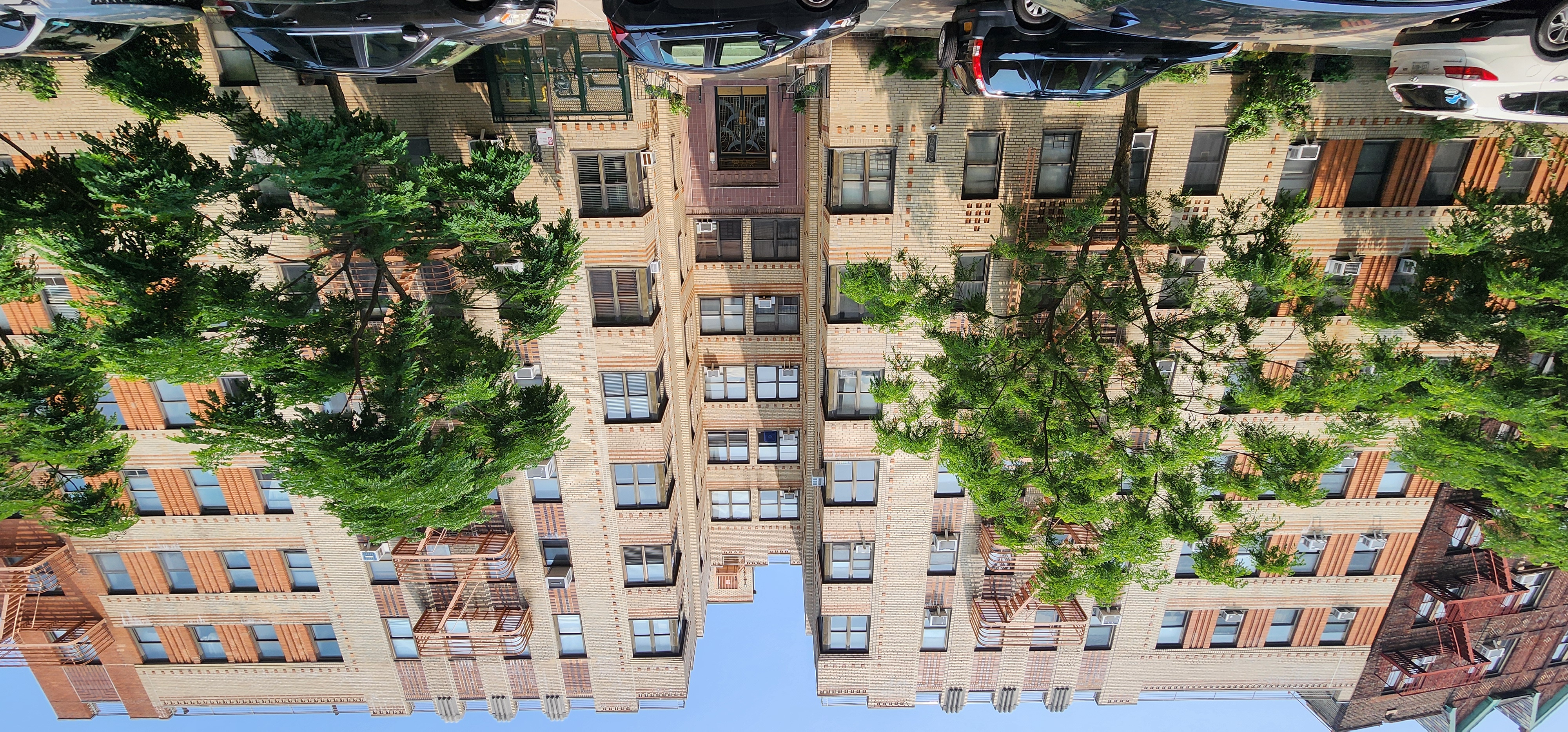 200 Pinehurst Avenue, Unit 5C Manhattan, NY 10033 - Photo 16 of 17 front view of a building with a street