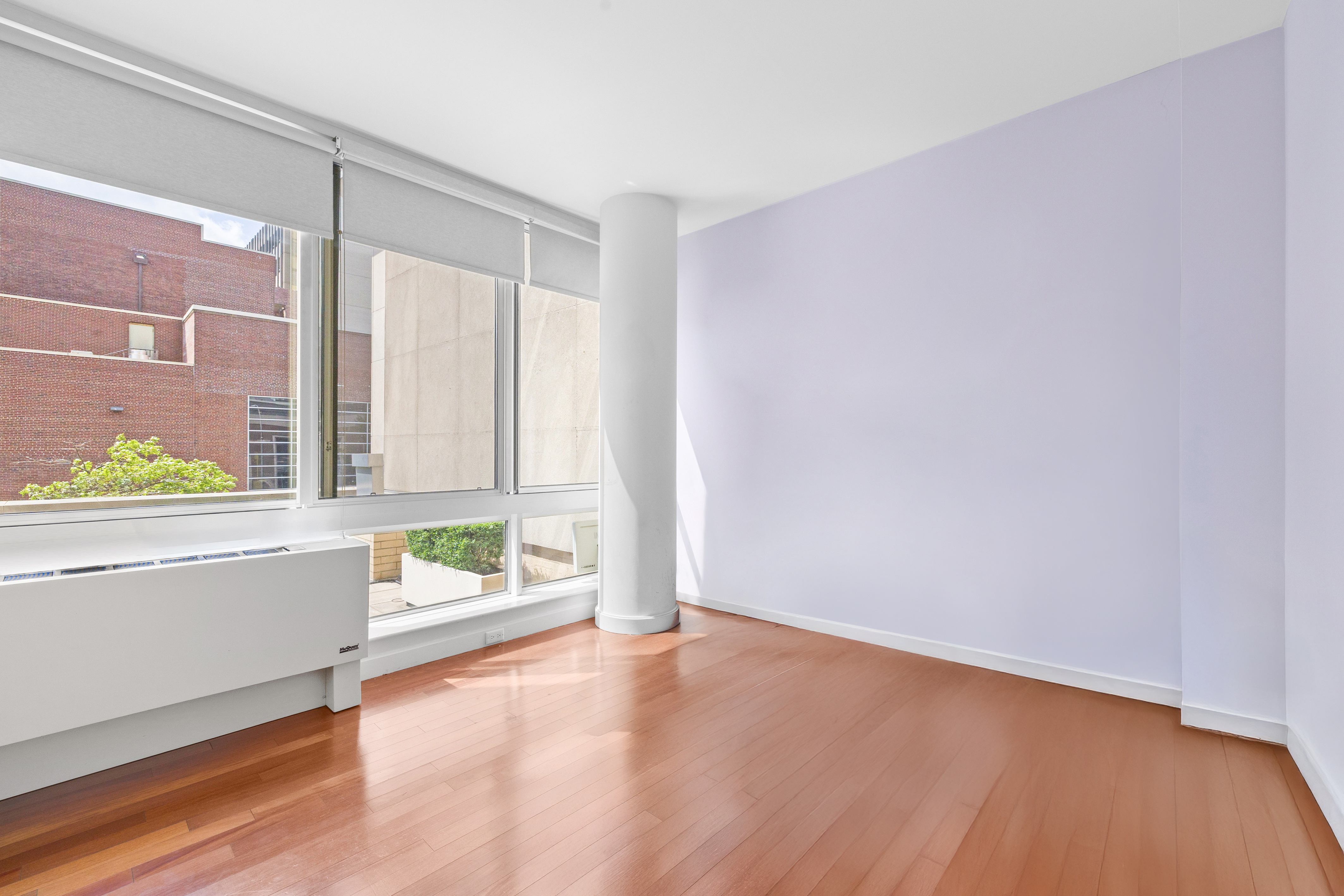 107-24 71st Road, Unit 2E Queens, NY 11375 - Photo 10 of 18 a view of an empty room with a window