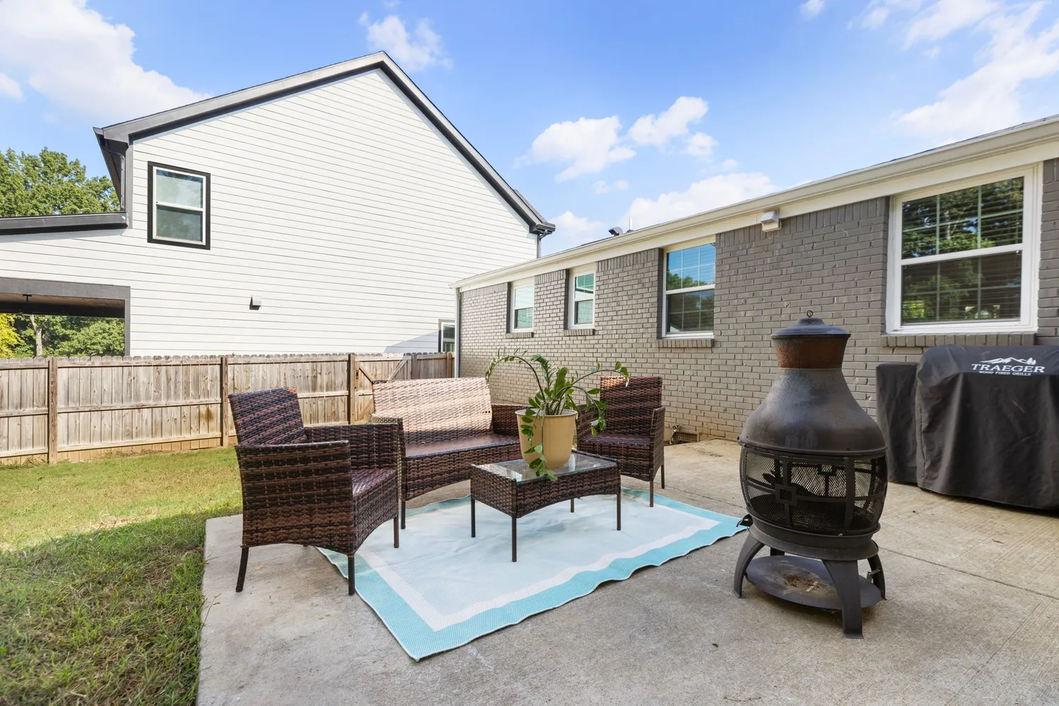 a view of a swimming pool and a yard