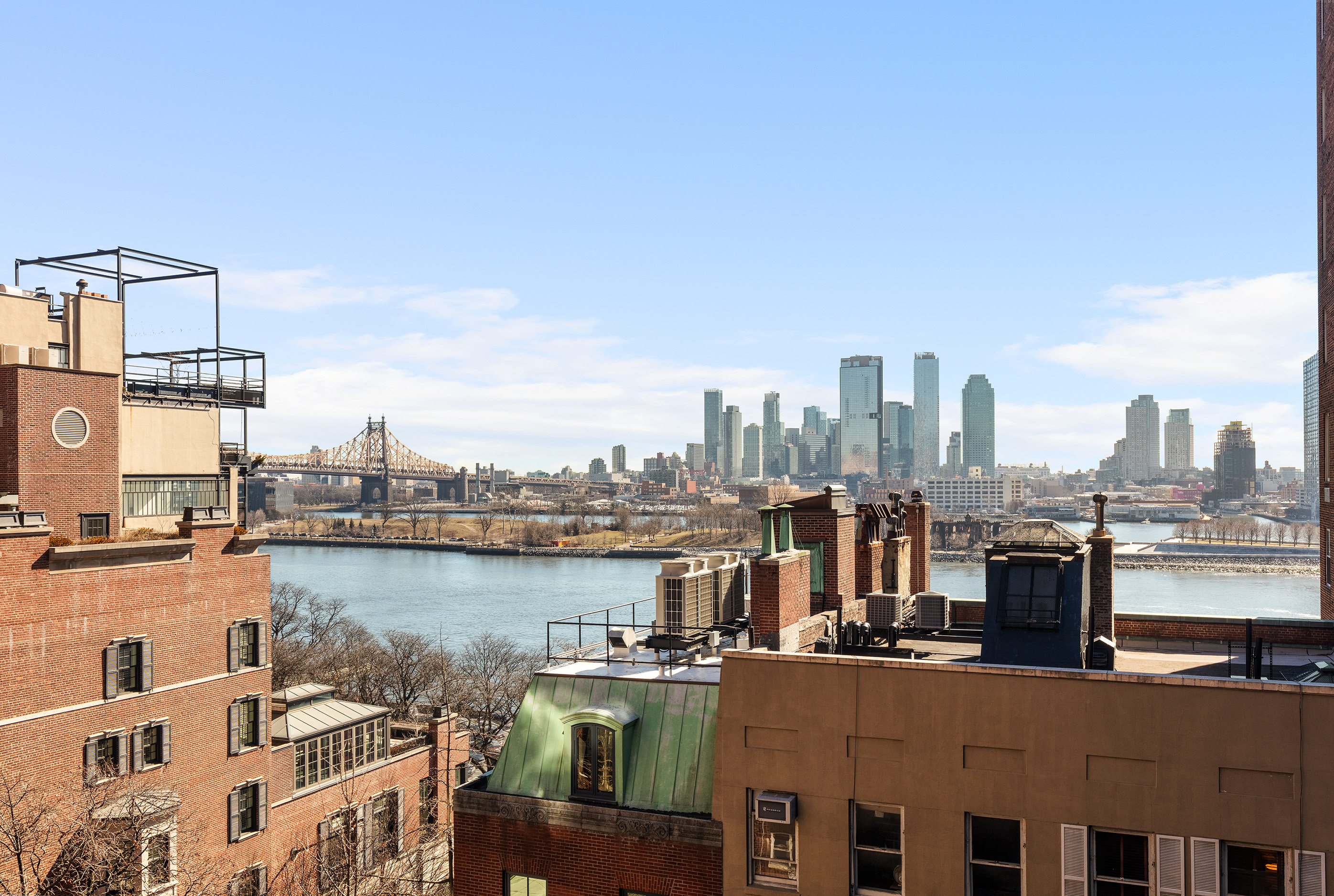 12 Beekman Place, Unit 7/8B Manhattan, NY 10022 - Photo 2 of 17 a view of a city with tall buildings
