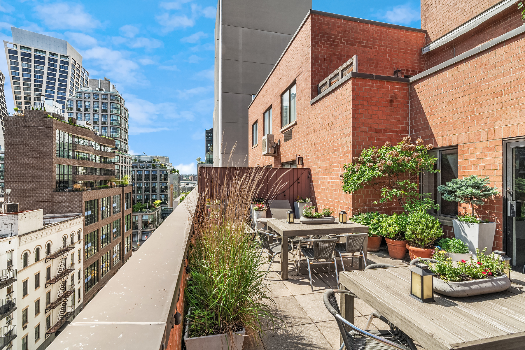445 West 19th Street, Unit 6C Manhattan, NY 10011 - Photo 8 of 10 a view of a chairs and table in the balcony