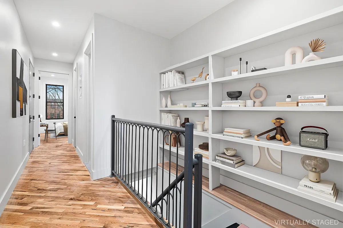 506 Woodward Avenue, Unit 1R Queens, NY 11385 - Photo 4 of 10 a view of a hallway with shelf