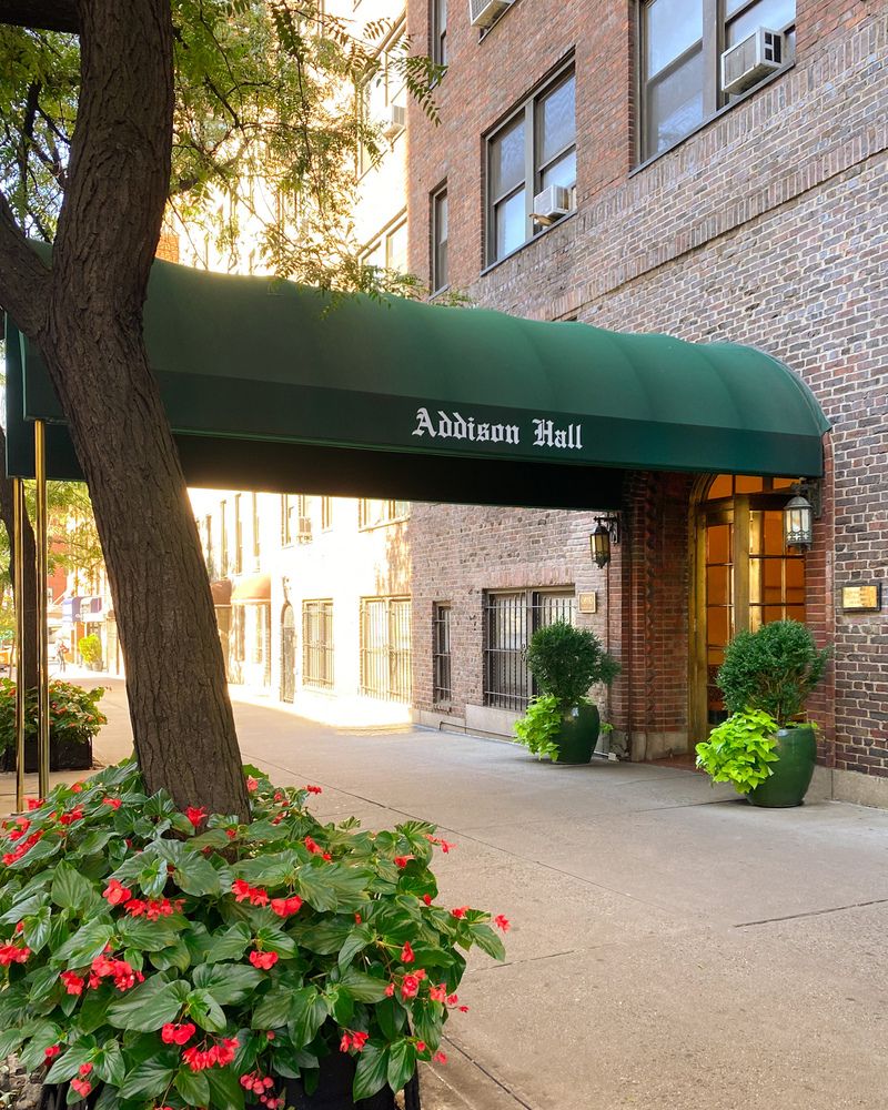 457 West 57th Street, Unit 912 Manhattan, NY 10019 - Photo 9 of 11 a front view of a house with a yard
