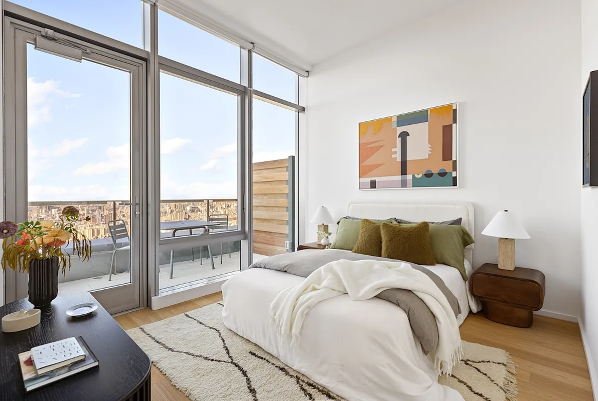 5 South 5th Street, Unit PH2B Brooklyn, NY 11249 - Photo 7 of 27 a bedroom with a large window and a bed