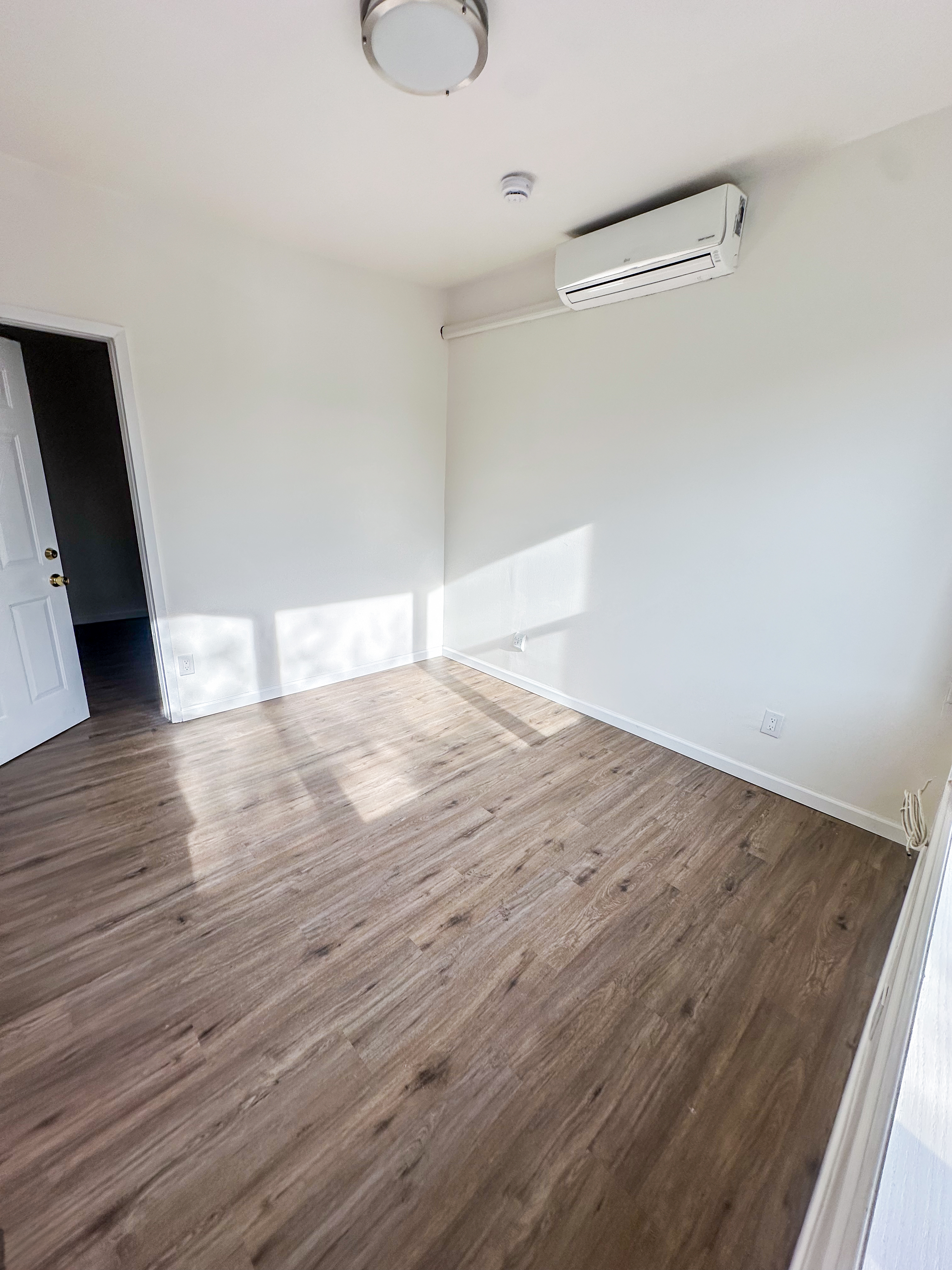 289 A Cooper Street, Unit 2 Brooklyn, NY 11237 - Photo 15 of 19 a view of a livingroom with wooden floor