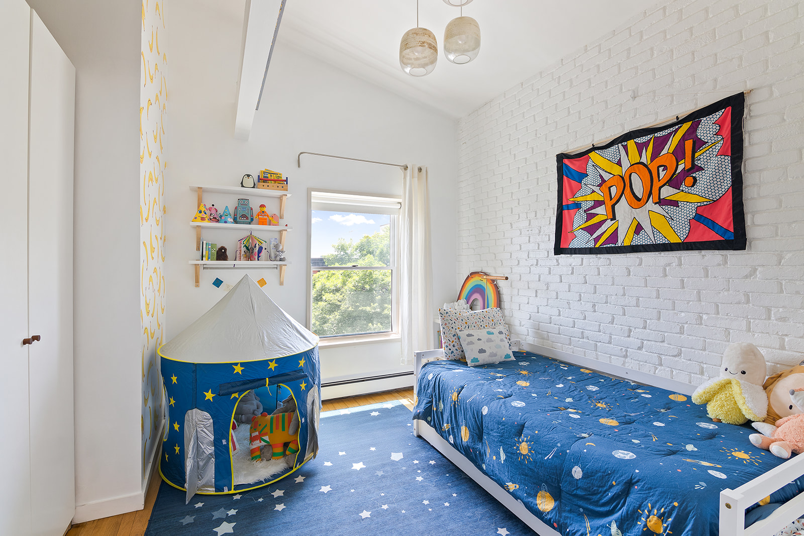 57 3rd Street, Unit 7 Brooklyn, NY 11231 - Photo 6 of 13 a bedroom with a bed and window