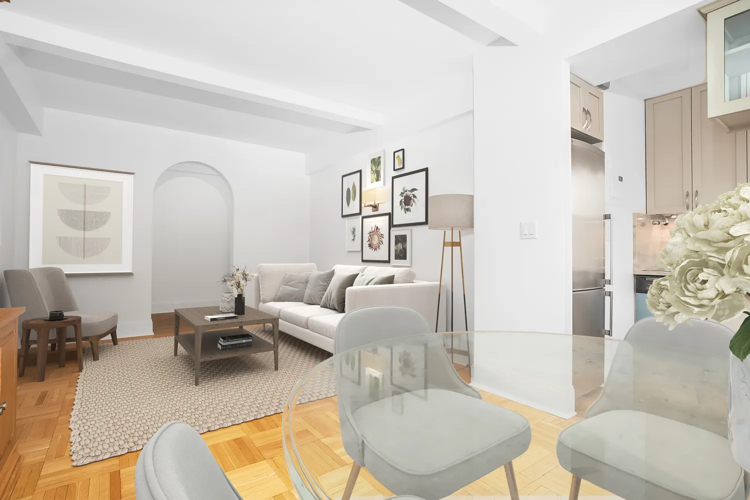 a living room with furniture or couch and a potted plant