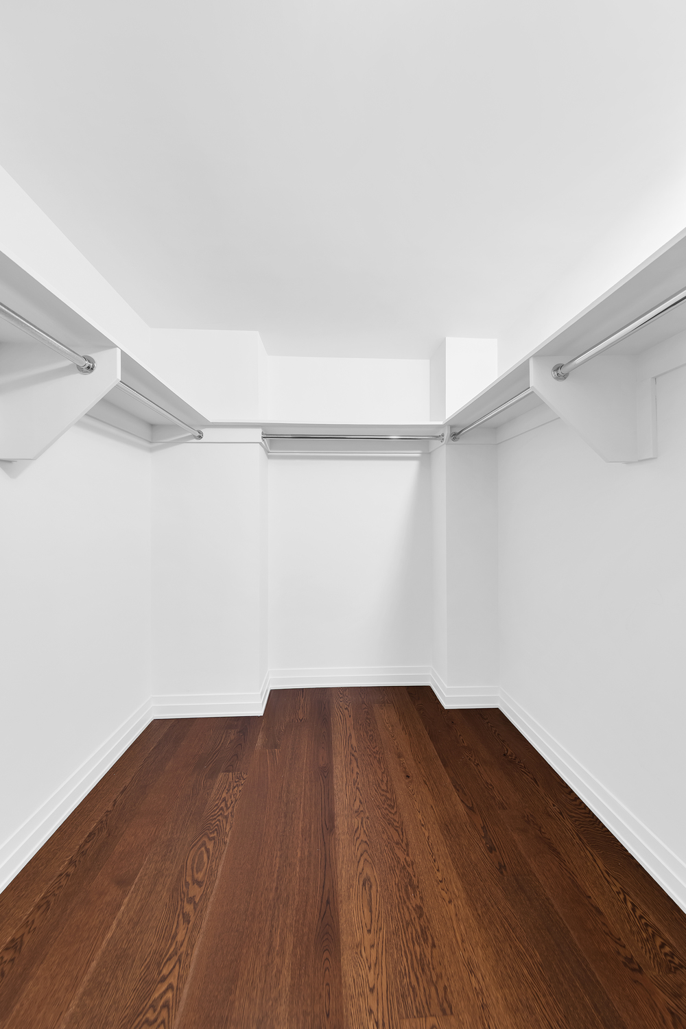 200 East 94th Street, Unit 315 Manhattan, NY 10128 - Photo 10 of 25 a view of a room with wooden floor
