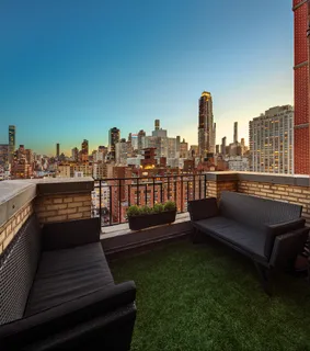 a view of a terrace with a bench