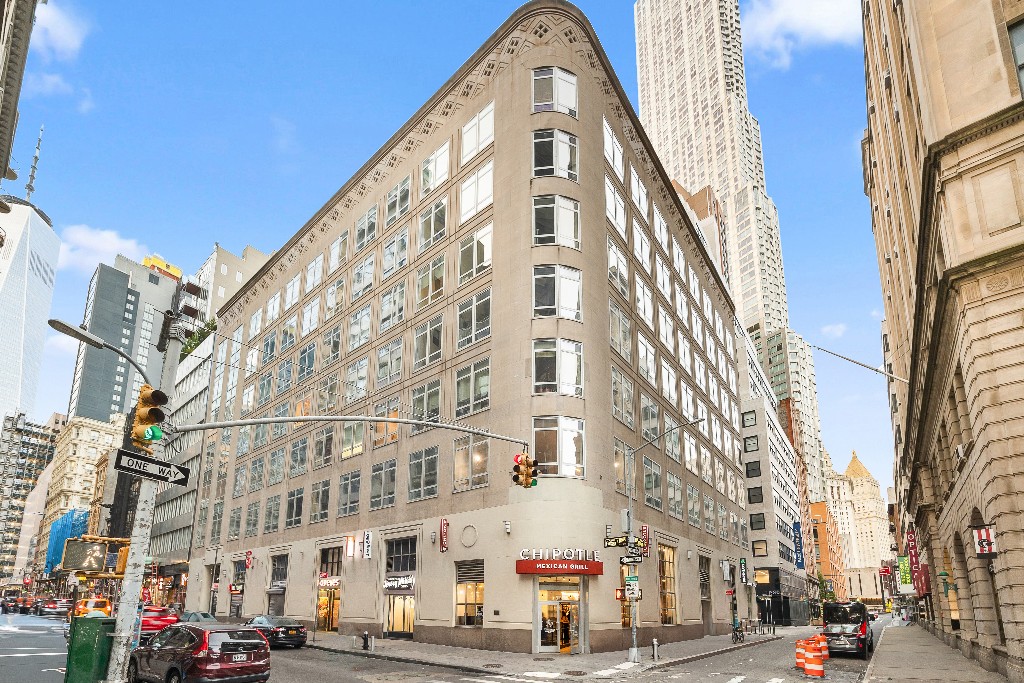 111 Fulton Street, Unit 824 Manhattan, NY 10038 - Photo 16 of 35 a front view of a building