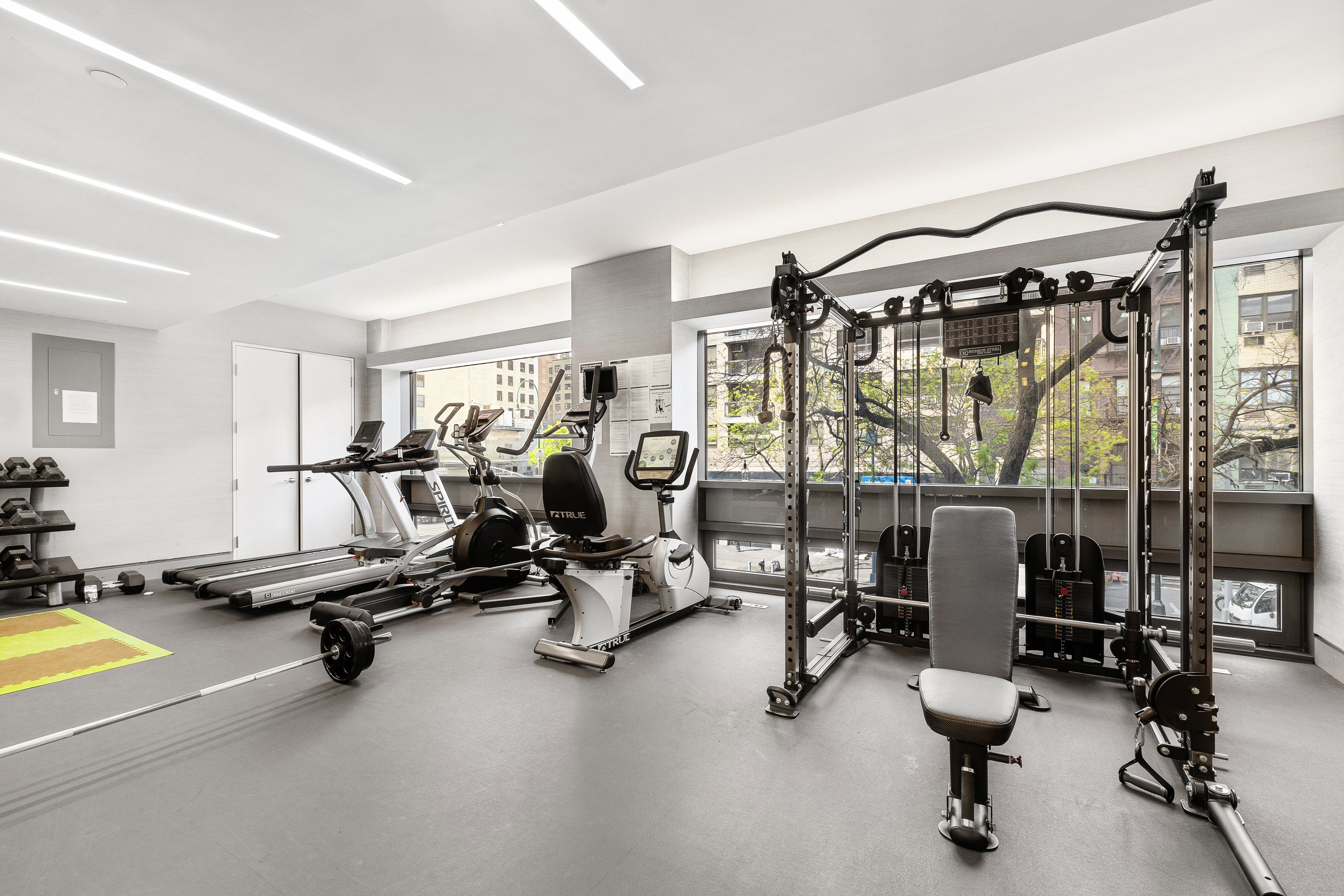 123 3rd Avenue, Unit 9C Manhattan, NY 10003 - Photo 14 of 16 a view of a room with gym equipment