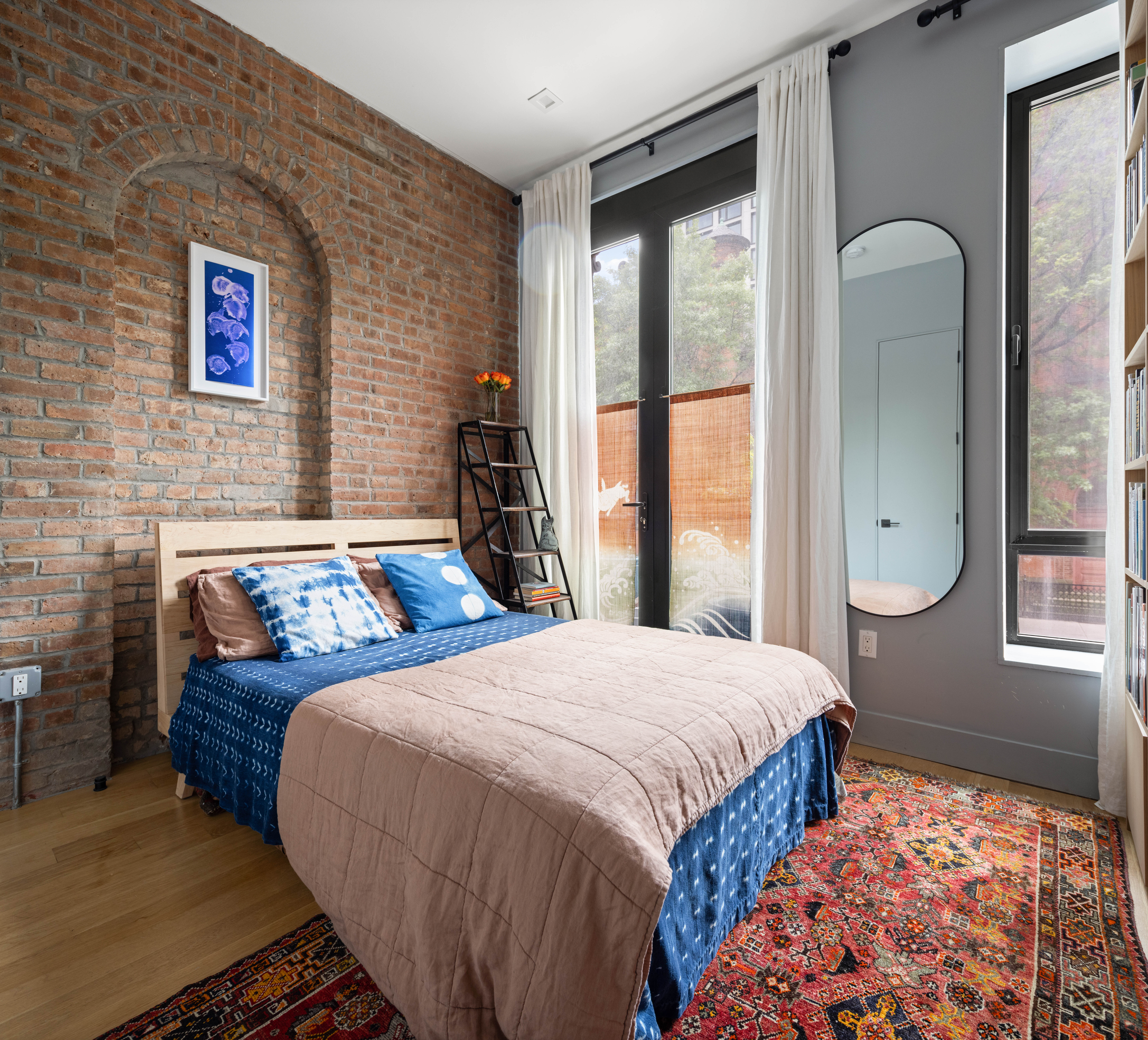 315 South 5th Street, Unit 2 Brooklyn, NY 11211 - Photo 5 of 10 a bedroom with a bed and a window