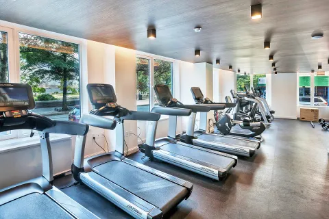 a view of a room with gym equipment