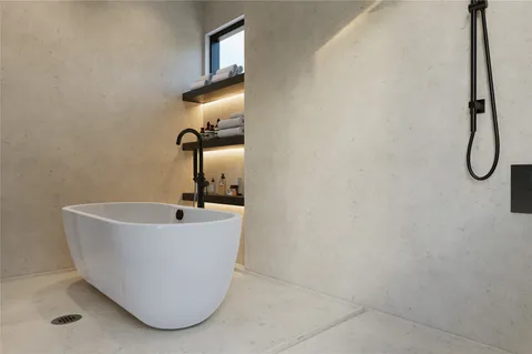 a bathroom with a bathtub