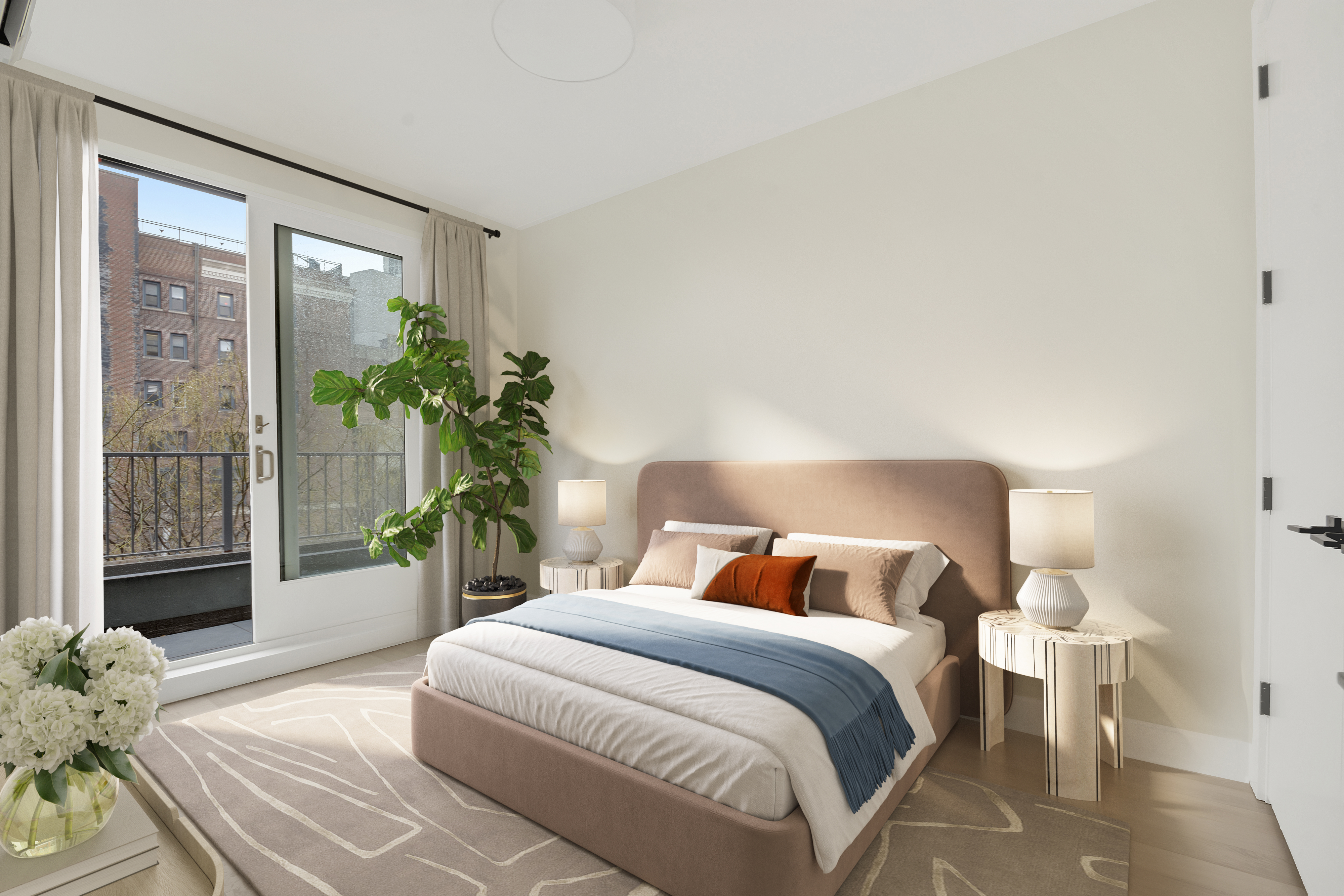 45 2nd Avenue, Unit 5 Manhattan, NY 10003 - Photo 4 of 8 a bedroom with a large bed and a potted plant