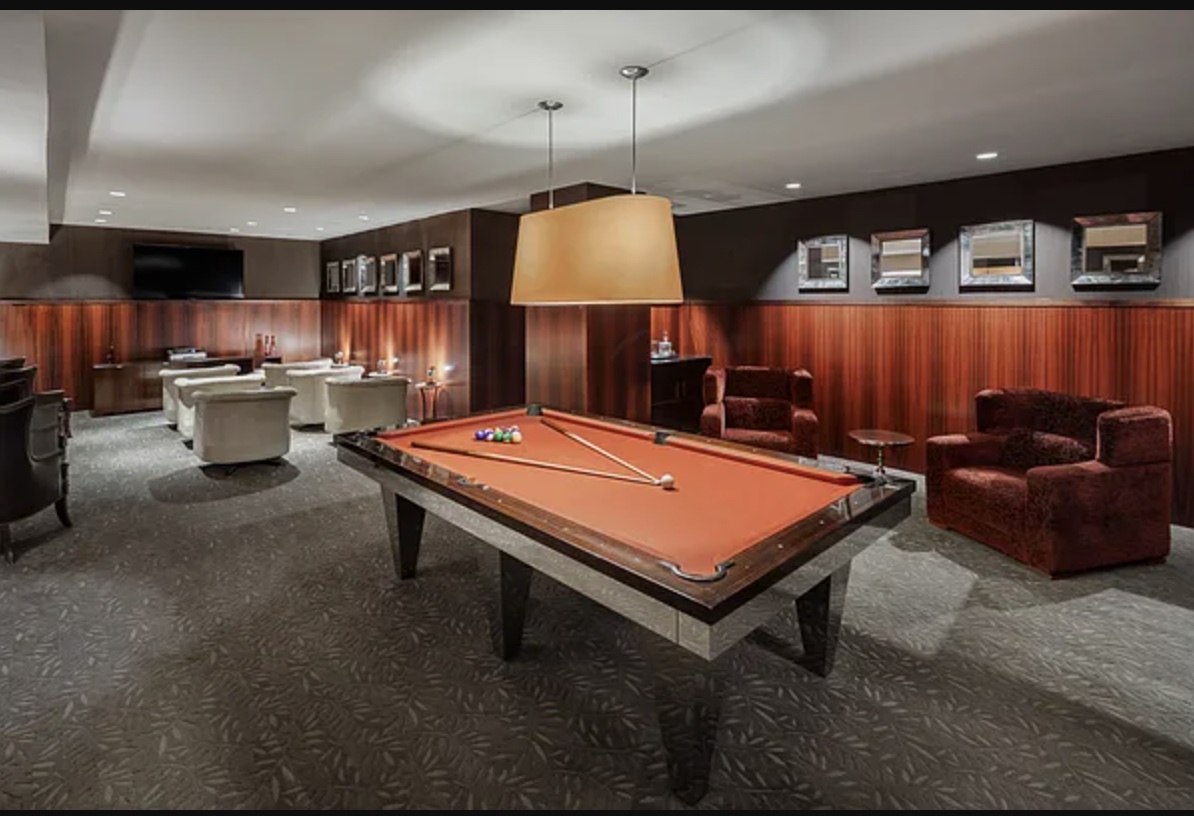 88 Greenwich Street, Unit 1023 Manhattan, NY 10006 - Photo 14 of 20 a room with furniture pool table and window