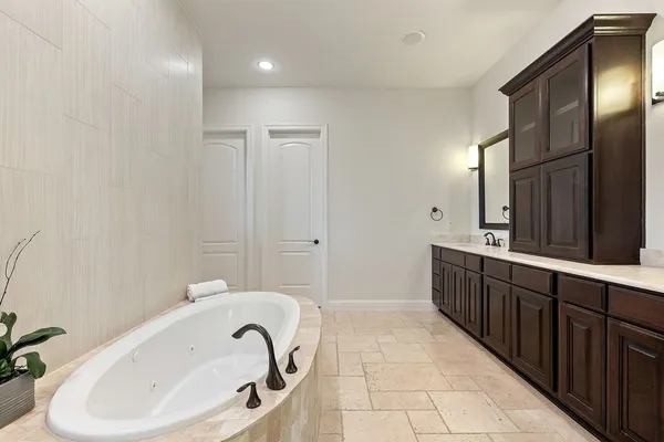 a open kitchen with stainless steel appliances granite countertop a stove and a refrigerator