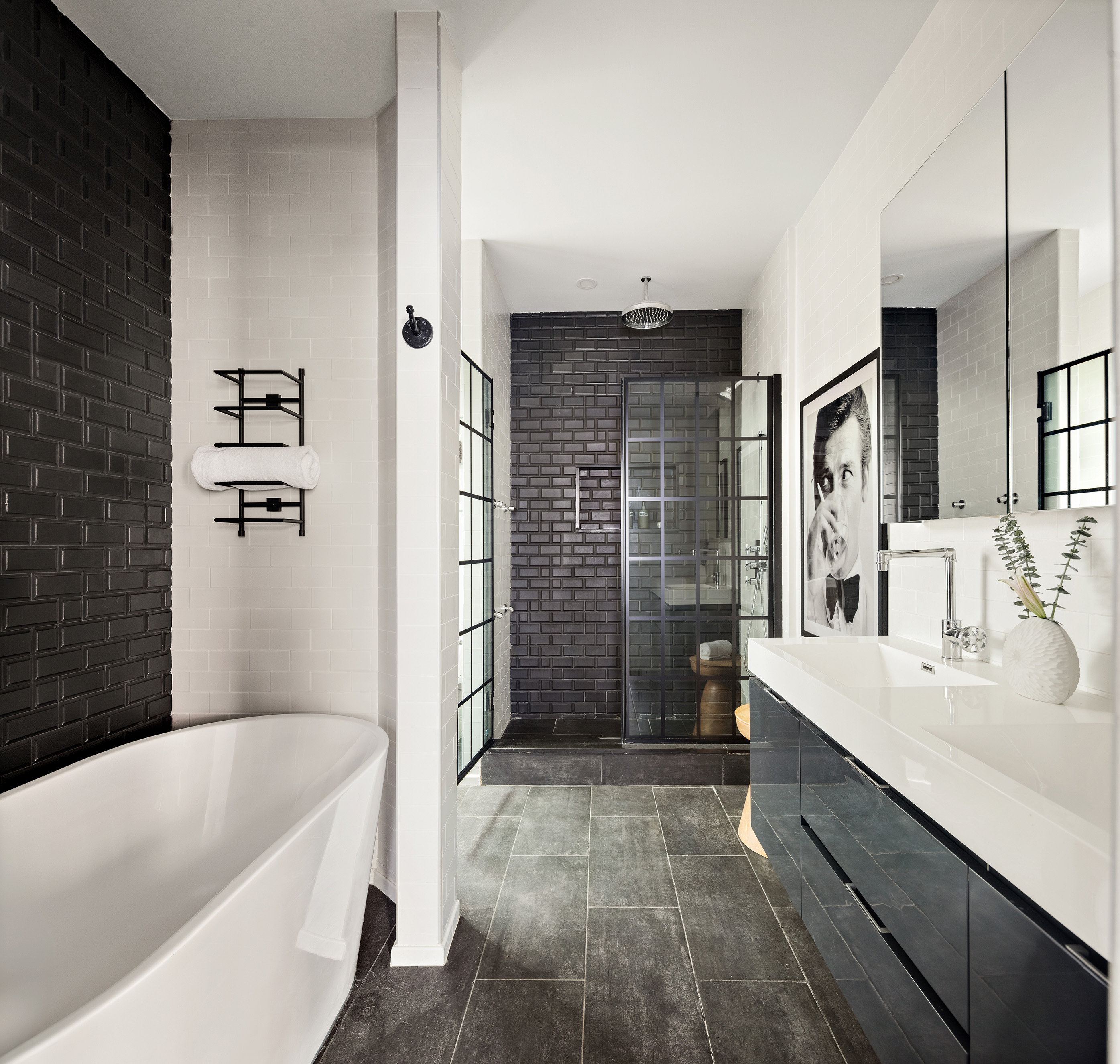 311 West 97th Street, Unit 5N Manhattan, NY 10025 - Photo 13 of 16 a bathroom with a tub a sink and a shower