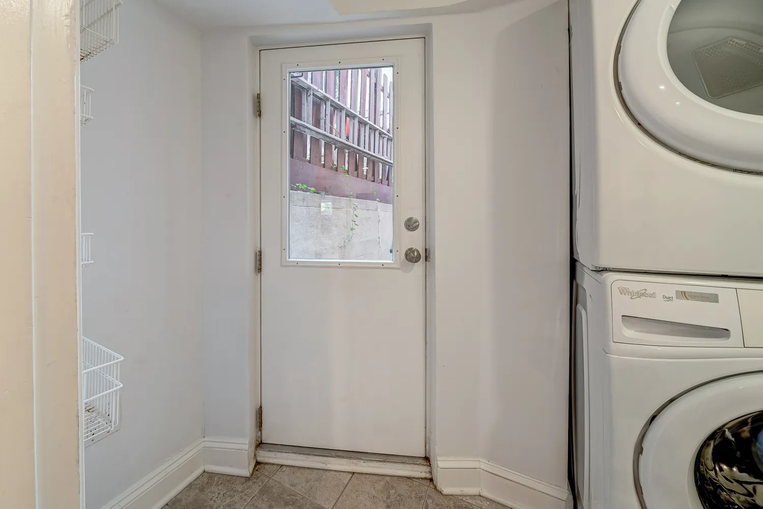 a kitchen with stainless steel appliances and cabinets