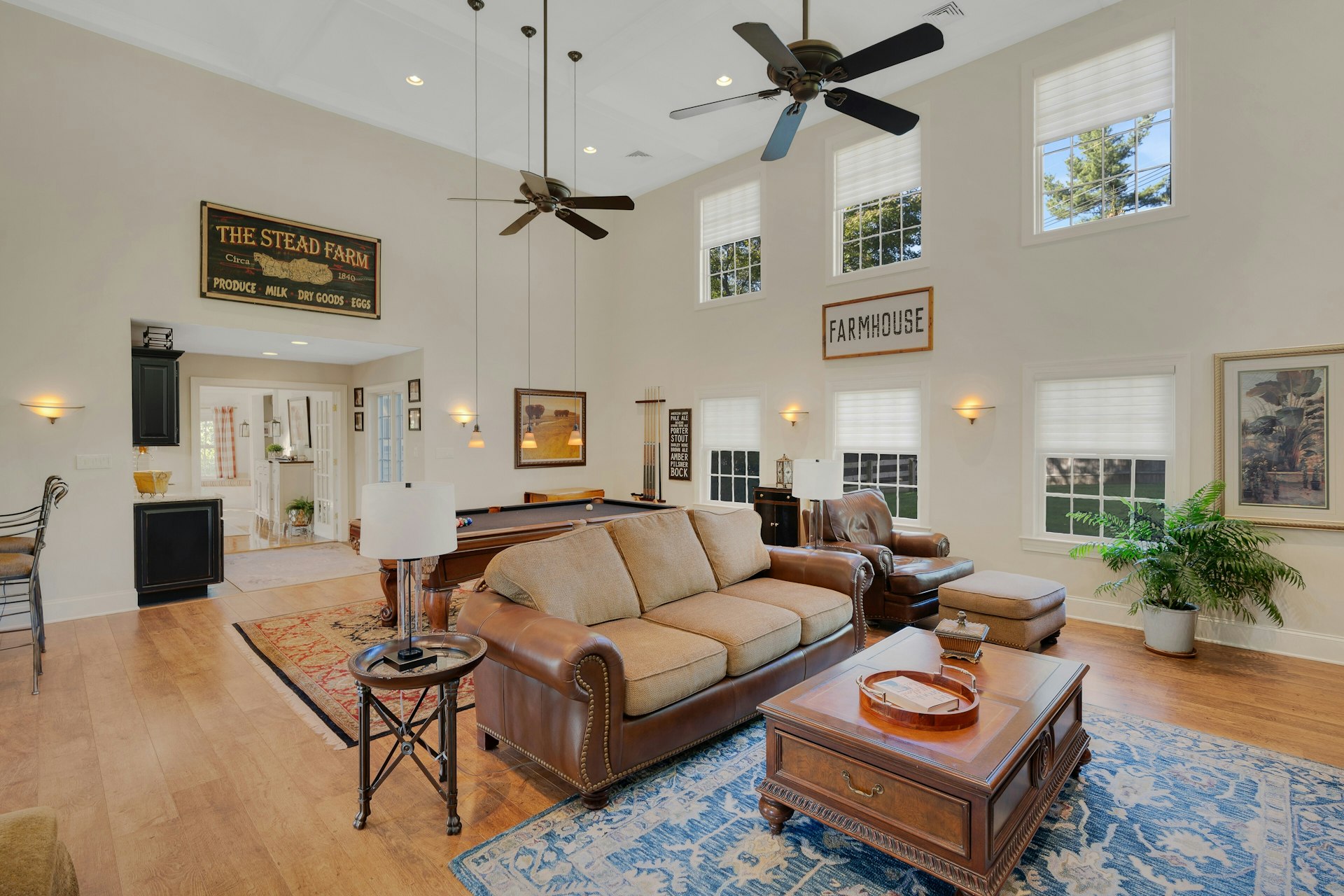 29 Evergreen Lane Watchung, NJ 07069 - Photo 9 of 54 a living room with furniture a ceiling fan and a rug