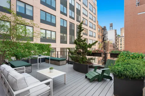 a building outdoor space with patio furniture