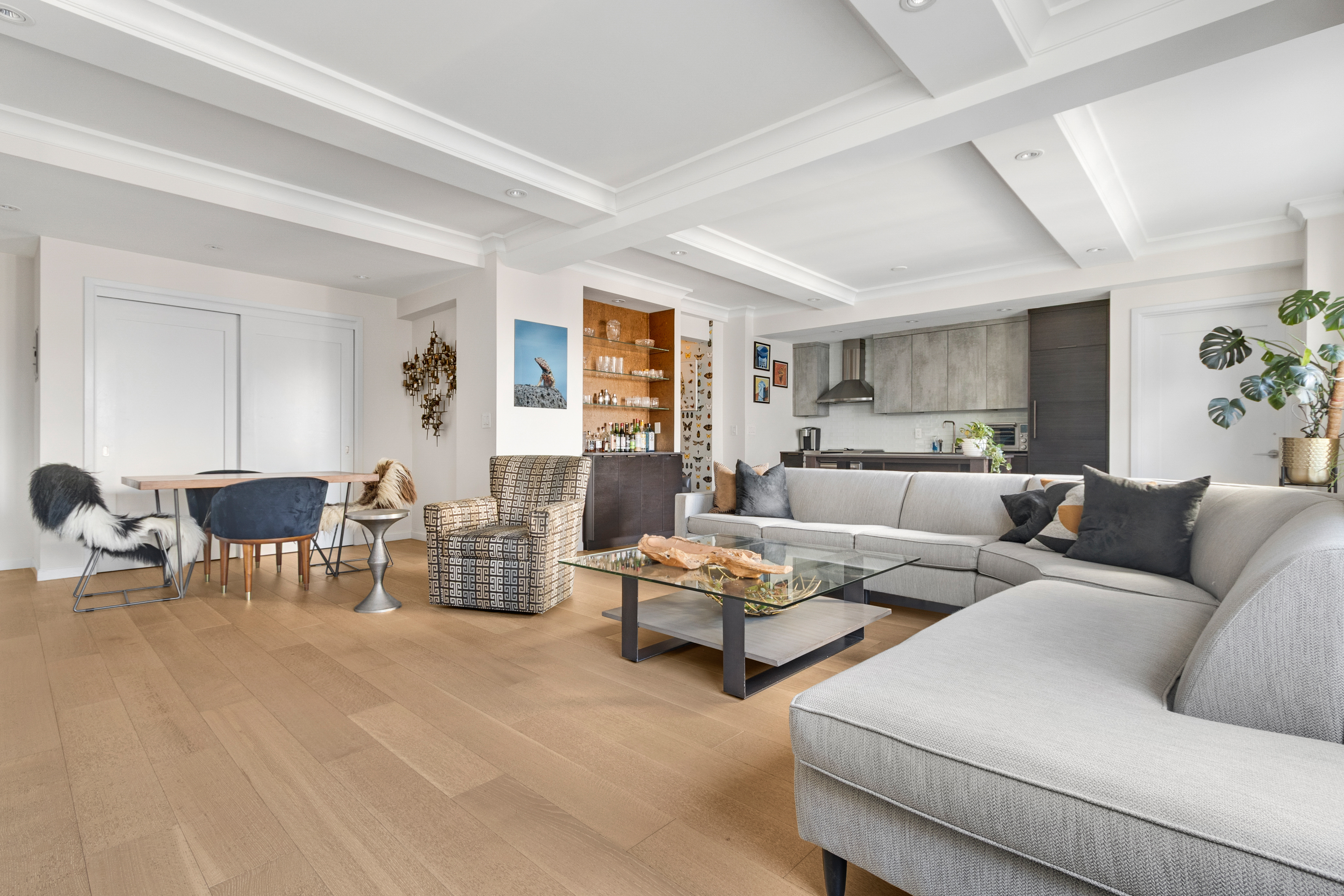 225 Central Park West, Unit 1516 Manhattan, NY 10024 - Photo 3 of 16 a living room with furniture and view of kitchen