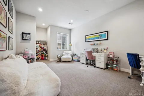 a view of a chairs and table in patio