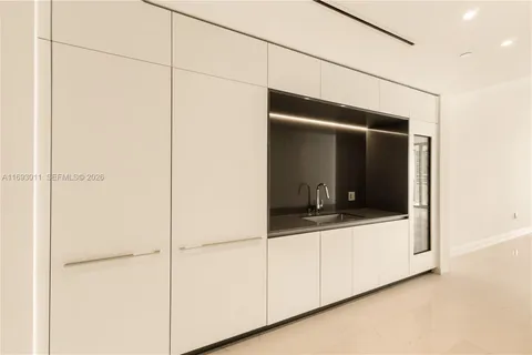 a view of a room that has a large window