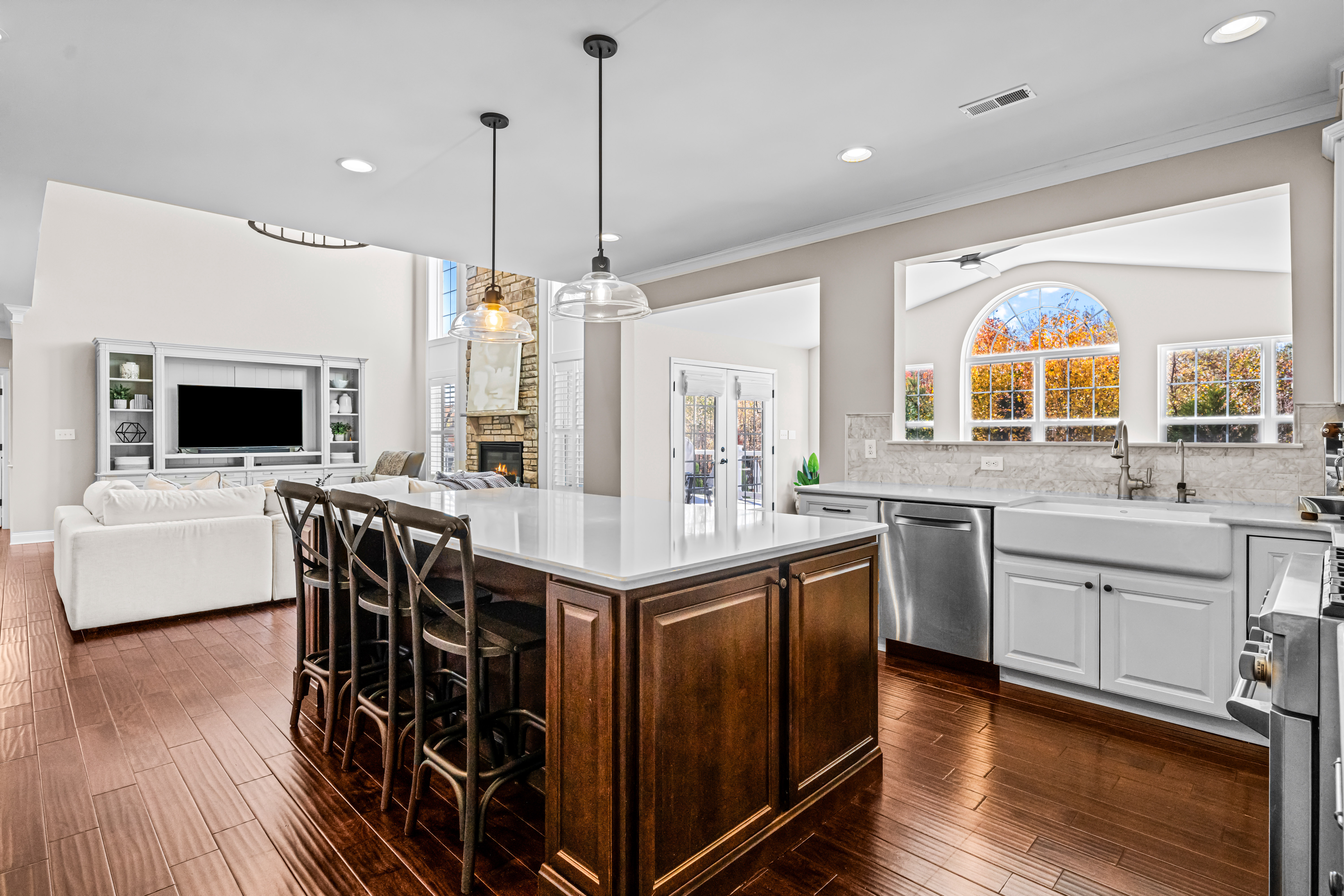 52 Wellesley Way Marlton, NJ 08053 - Photo 50 of 98 a kitchen with stainless steel appliances granite countertop a stove a sink dishwasher a microwave oven with a dining table and chairs