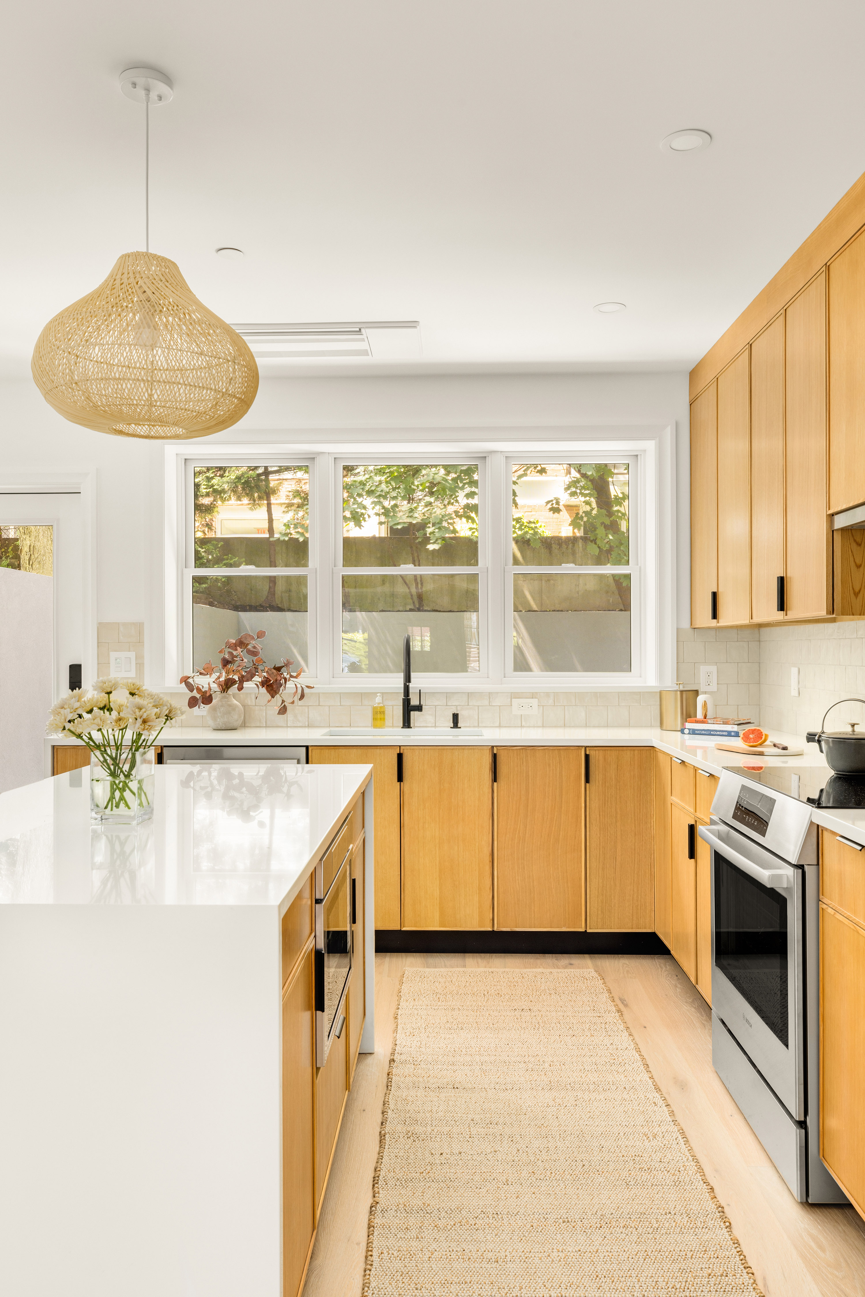 578 20th Street Brooklyn, NY 11218 - Photo 4 of 28 a kitchen with a sink cabinets and window